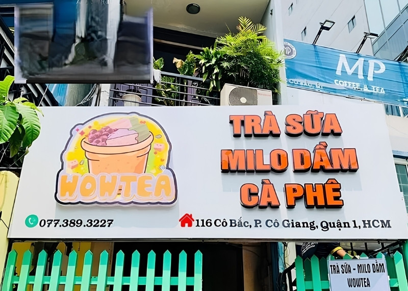 Bảng hiệu quán trà sữa Wowtea