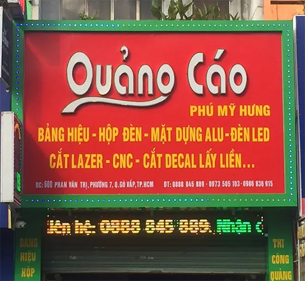 bảng hiệu nền vàng chữ đỏ