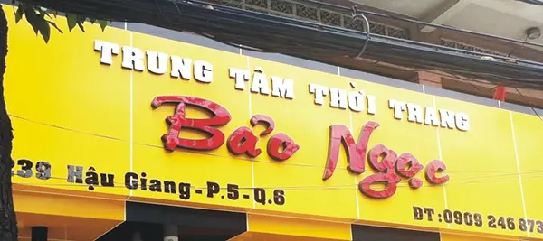 bảng hiệu nền vàng chữ đỏ